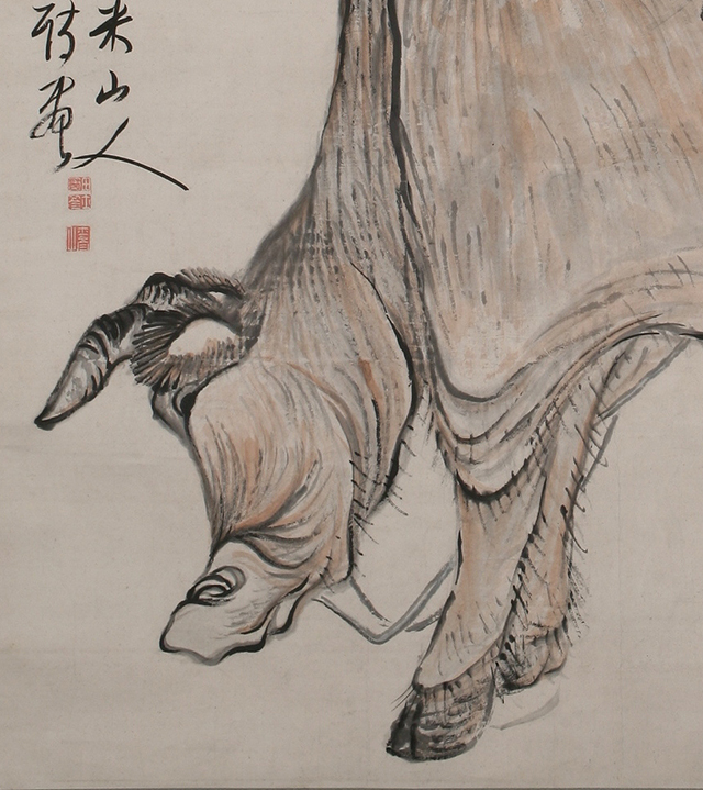 A Young Boy on a Cow