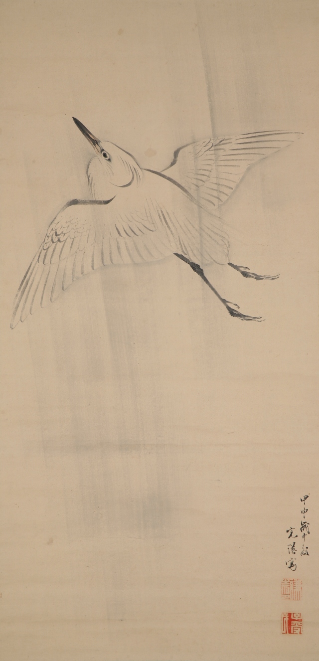 A White Heron Flying in the Rain